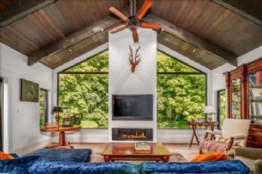 Living Room Fireplace - Country homes for sale and luxury real estate including horse farms and property in the Caledon and King City areas near Toronto