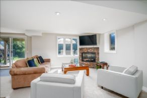 Lower level rec room seating area - Country homes for sale and luxury real estate including horse farms and property in the Caledon and King City areas near Toronto